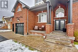 Covered Front Porch and Entrance - 