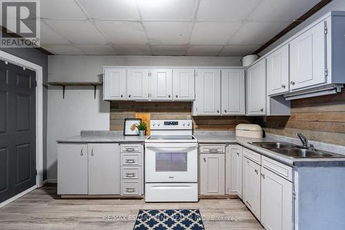 52 Connaught Avenue N, Hamilton, ON - Indoor Photo Showing Kitchen With Double Sink