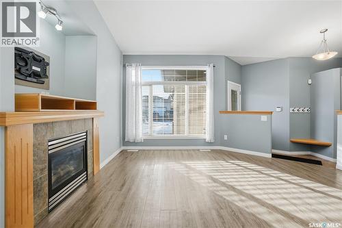 7902 Thrush Street, Regina, SK - Indoor Photo Showing Living Room With Fireplace