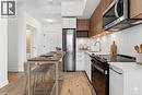 Virtually Presented - 500 Plains Road E Unit# 207, Burlington, ON  - Indoor Photo Showing Kitchen With Stainless Steel Kitchen With Upgraded Kitchen 