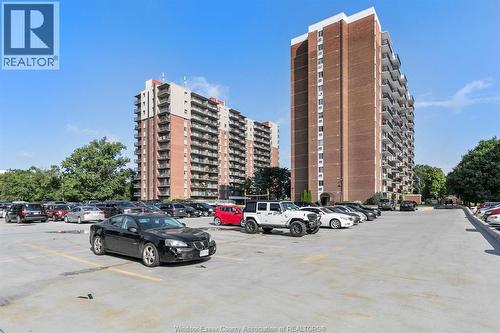 8591 Riverside Dr. E. Unit# 802, Windsor, ON - Outdoor With Balcony With Facade