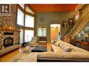 Cosy up in front of the fireplace with blinds up or down. - 19-3453 Cessna Road, Enderby, BC  - Indoor Photo Showing Living Room With Fireplace 