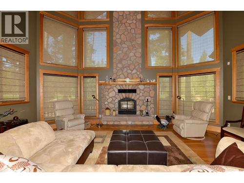 Vaulted ceilings add to the majesty of this great living room. - 19-3453 Cessna Road, Enderby, BC - Indoor Photo Showing Living Room With Fireplace