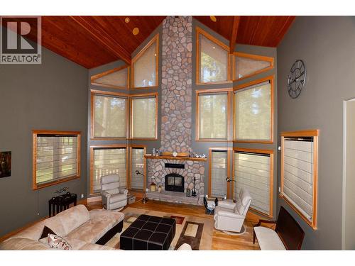 Live year round in this gated community and enjoy summer and winter sports! - 19-3453 Cessna Road, Enderby, BC - Indoor With Fireplace