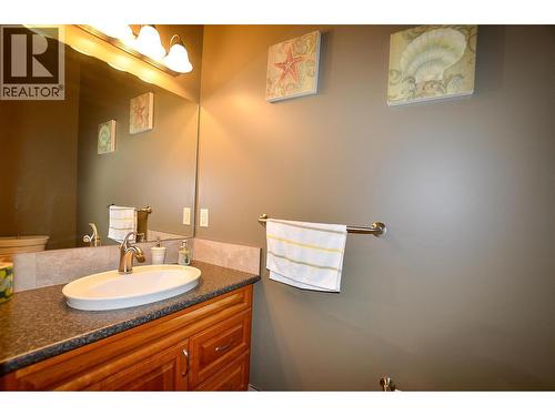 Hall way half bathroom is perfect for visitors. - 19-3453 Cessna Road, Enderby, BC - Indoor Photo Showing Bathroom