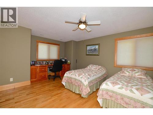 Double closets, double bed and built in dest - 19-3453 Cessna Road, Enderby, BC - Indoor Photo Showing Bedroom