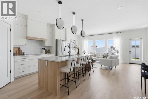 24 720 Brighton Boulevard, Saskatoon, SK - Indoor Photo Showing Kitchen With Upgraded Kitchen