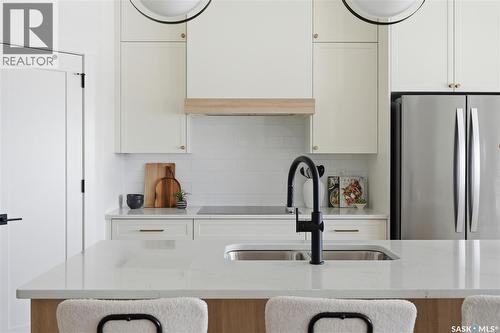 24 720 Brighton Boulevard, Saskatoon, SK - Indoor Photo Showing Kitchen With Double Sink With Upgraded Kitchen