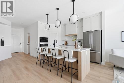 24 720 Brighton Boulevard, Saskatoon, SK - Indoor Photo Showing Kitchen With Upgraded Kitchen