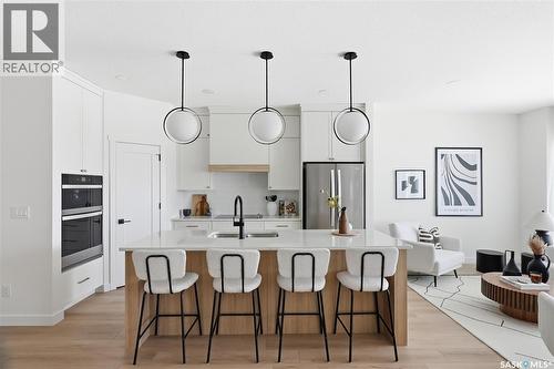 24 720 Brighton Boulevard, Saskatoon, SK - Indoor Photo Showing Kitchen With Upgraded Kitchen