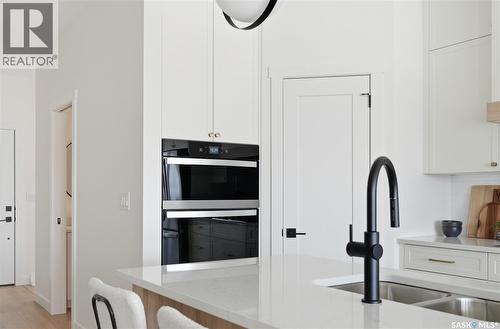 24 720 Brighton Boulevard, Saskatoon, SK - Indoor Photo Showing Kitchen With Double Sink