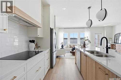 24 720 Brighton Boulevard, Saskatoon, SK - Indoor Photo Showing Kitchen With Double Sink With Upgraded Kitchen