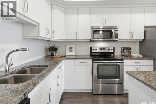 212 770 Childers Crescent, Saskatoon, SK - Indoor Photo Showing Kitchen With Stainless Steel Kitchen With Double Sink