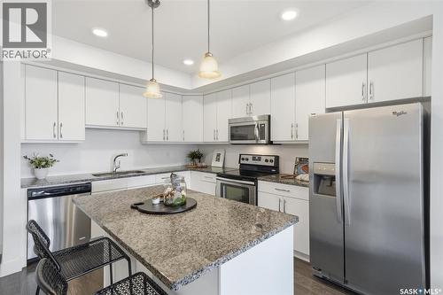 212 770 Childers Crescent, Saskatoon, SK - Indoor Photo Showing Kitchen With Stainless Steel Kitchen With Upgraded Kitchen