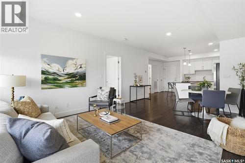 212 770 Childers Crescent, Saskatoon, SK - Indoor Photo Showing Living Room