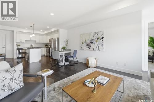 212 770 Childers Crescent, Saskatoon, SK - Indoor Photo Showing Living Room
