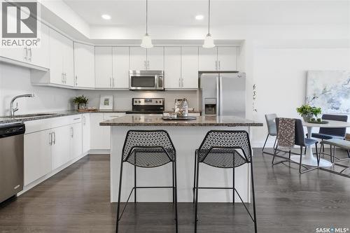 212 770 Childers Crescent, Saskatoon, SK - Indoor Photo Showing Kitchen With Stainless Steel Kitchen With Upgraded Kitchen