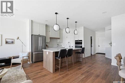 22 720 Brighton Boulevard, Saskatoon, SK - Indoor Photo Showing Kitchen With Upgraded Kitchen