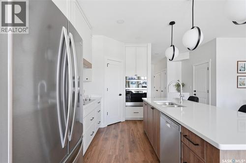 22 720 Brighton Boulevard, Saskatoon, SK - Indoor Photo Showing Kitchen With Double Sink With Upgraded Kitchen