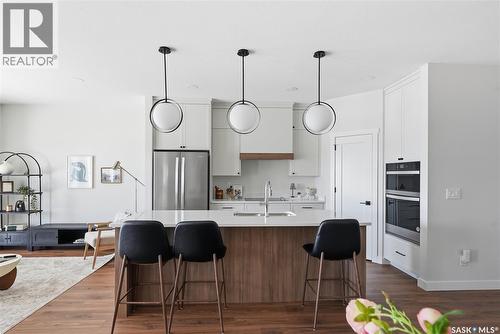 22 720 Brighton Boulevard, Saskatoon, SK - Indoor Photo Showing Kitchen With Upgraded Kitchen