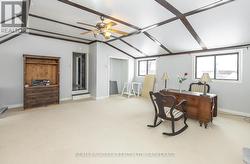 UPPER LIVING ROOM OR FAMILY ROOM - 