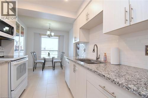 102 Elderwood Place, Brampton, ON - Indoor Photo Showing Kitchen With Double Sink With Upgraded Kitchen