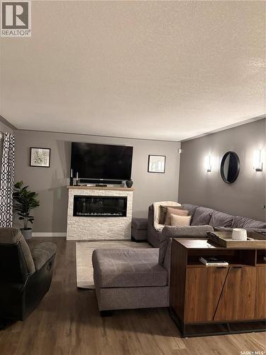 412 5Th Street Ne, Ituna, SK - Indoor Photo Showing Living Room With Fireplace