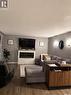 412 5Th Street Ne, Ituna, SK  - Indoor Photo Showing Living Room With Fireplace 