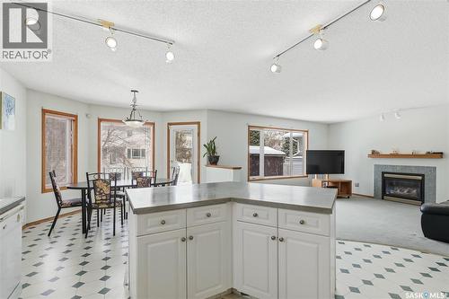 3232 Thames Crescent E, Regina, SK - Indoor With Fireplace