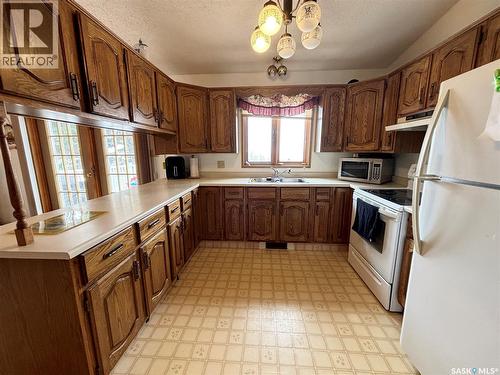 52 Harrigan Crescent, Maple Creek, SK - Indoor Photo Showing Kitchen With Double Sink