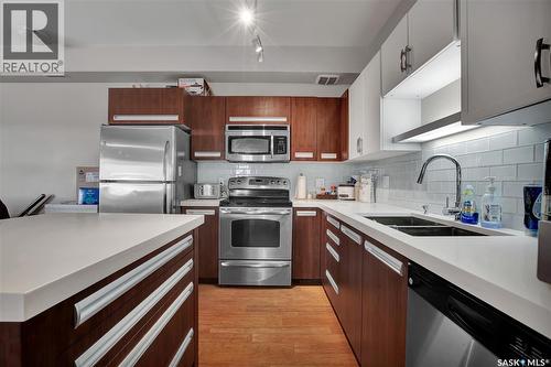 312 1015 Patrick Crescent, Saskatoon, SK - Indoor Photo Showing Kitchen With Stainless Steel Kitchen With Double Sink