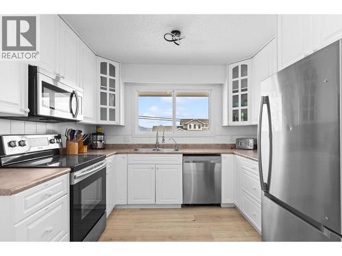 2618 Thacker Drive, West Kelowna, BC - Indoor Photo Showing Kitchen With Double Sink