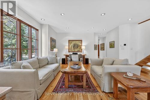 Living room with amazing views - 12 Walker Road, Tiny, ON - Indoor Photo Showing Living Room