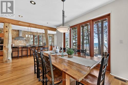 Dining room w walk out to the waterside - 12 Walker Road, Tiny, ON - Indoor Photo Showing Dining Room