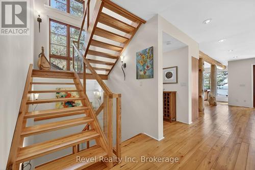 Let's go upstairs - 12 Walker Road, Tiny, ON - Indoor Photo Showing Other Room