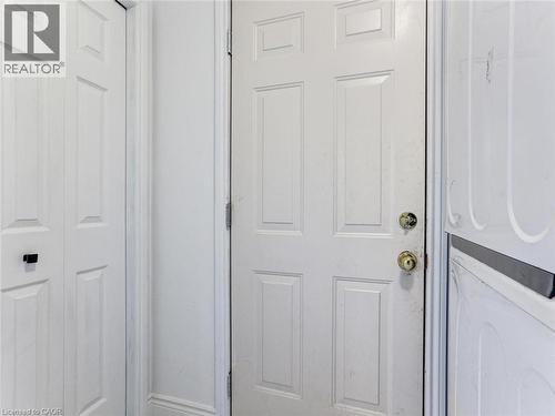 White paneled door with brass hardware - 154 Deerpath Drive, Guelph, ON - Indoor Photo Showing Other Room