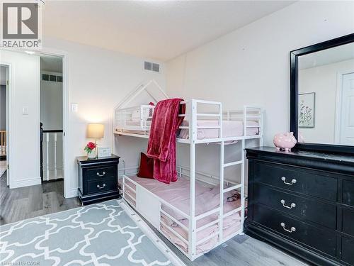 Room featuring wood-finish flooring and white walls - 154 Deerpath Drive, Guelph, ON - Indoor