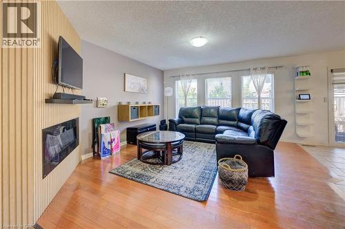 12 Bugdale Drive, Cambridge, ON - Indoor Photo Showing Living Room With Fireplace