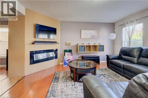 12 Bugdale Drive, Cambridge, ON - Indoor Photo Showing Living Room With Fireplace
