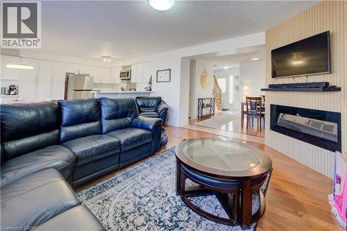 12 Bugdale Drive, Cambridge, ON - Indoor Photo Showing Living Room With Fireplace