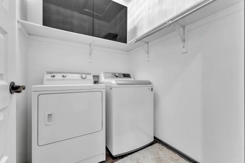 Salle de lavage - 40 Ch. Des Échassiers, Val-Des-Monts, QC - Indoor Photo Showing Laundry Room