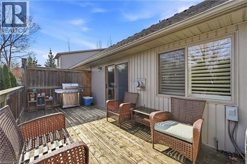 Expansive wood deck with privacy fencing and a sliding glass door entry - 7 Gibson Place Unit# 26, St. Catharines, ON - Outdoor With Deck Patio Veranda With Exterior