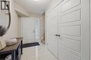 Entryway featuring white tile flooring and neutral wall tones - 7 Gibson Place Unit# 26, St. Catharines, ON  - Indoor Photo Showing Other Room 