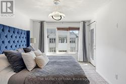 Primary Bedroom Offers Lots of Natural Light - 