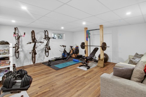 Salle familiale - 74 Rue Grandmaison, Mont-Blanc, QC - Indoor Photo Showing Gym Room