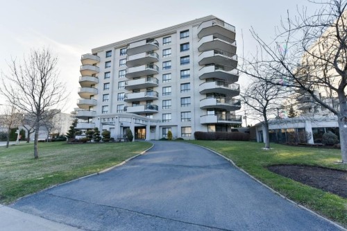 Front of Structure - 102-999 Rue White, Montréal (Saint-Laurent), QC - Outdoor With Balcony With Facade