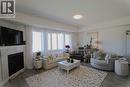 2897 Robinson Road, Lake Country, BC  - Indoor Photo Showing Living Room With Fireplace 