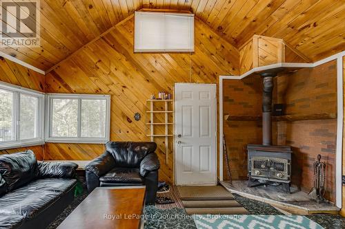 35 Tiny Beaches Road S, Tiny, ON - Indoor Photo Showing Living Room With Fireplace