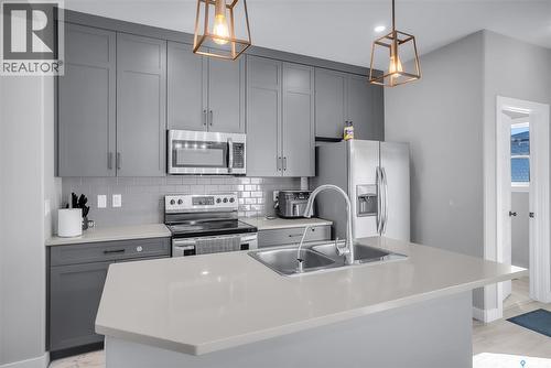 608 Brighton Gate, Saskatoon, SK - Indoor Photo Showing Kitchen With Stainless Steel Kitchen With Upgraded Kitchen