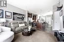 148 3229 Elgaard Drive, Regina, SK  - Indoor Photo Showing Living Room 